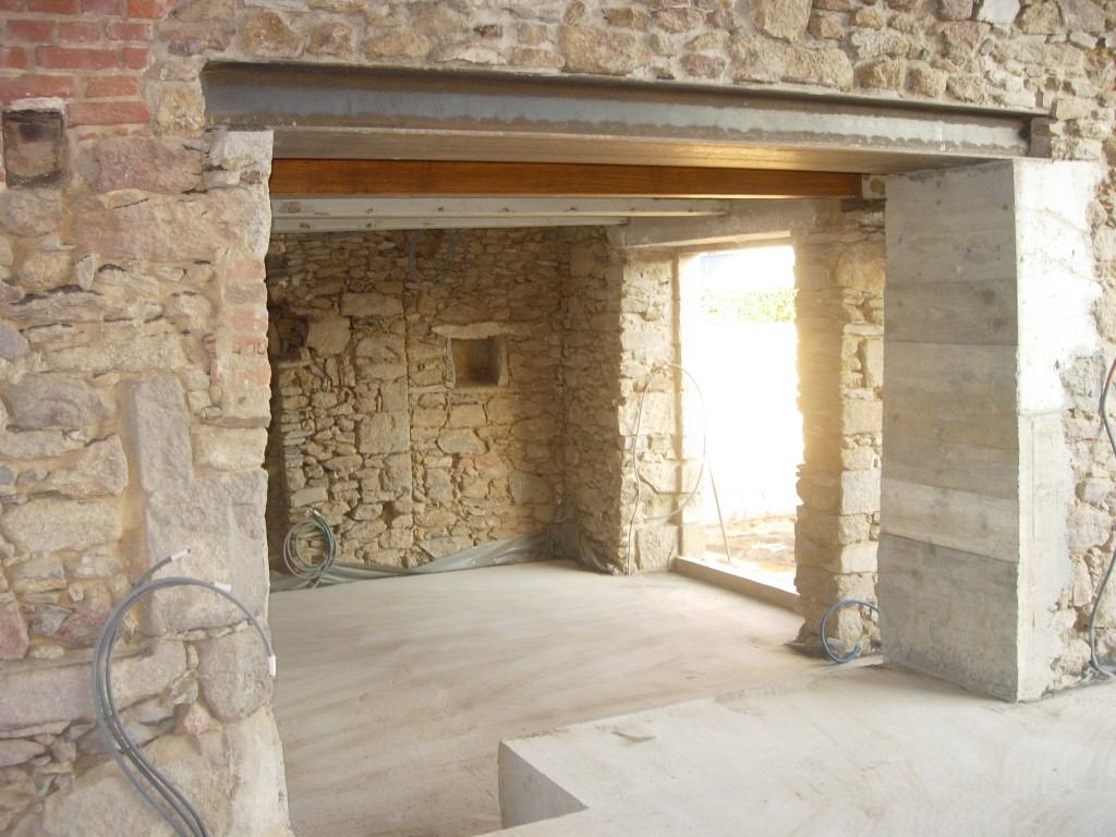 Ouverture de mur en pierre, en béton à Vignol